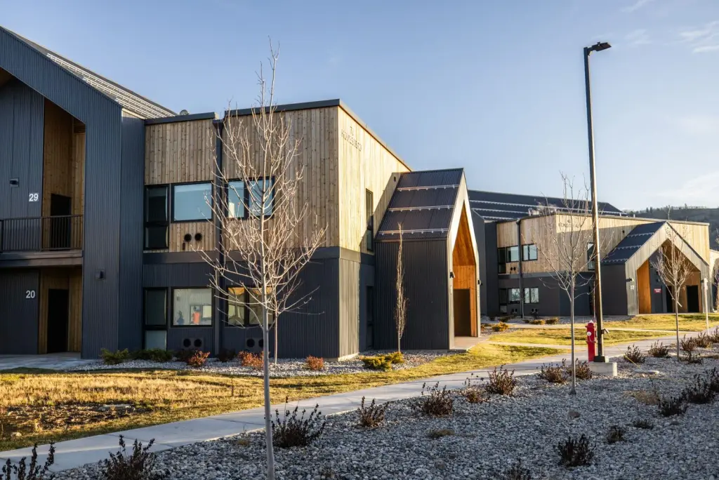 Teton Flats building entries and landscaped walkway with a streetlight